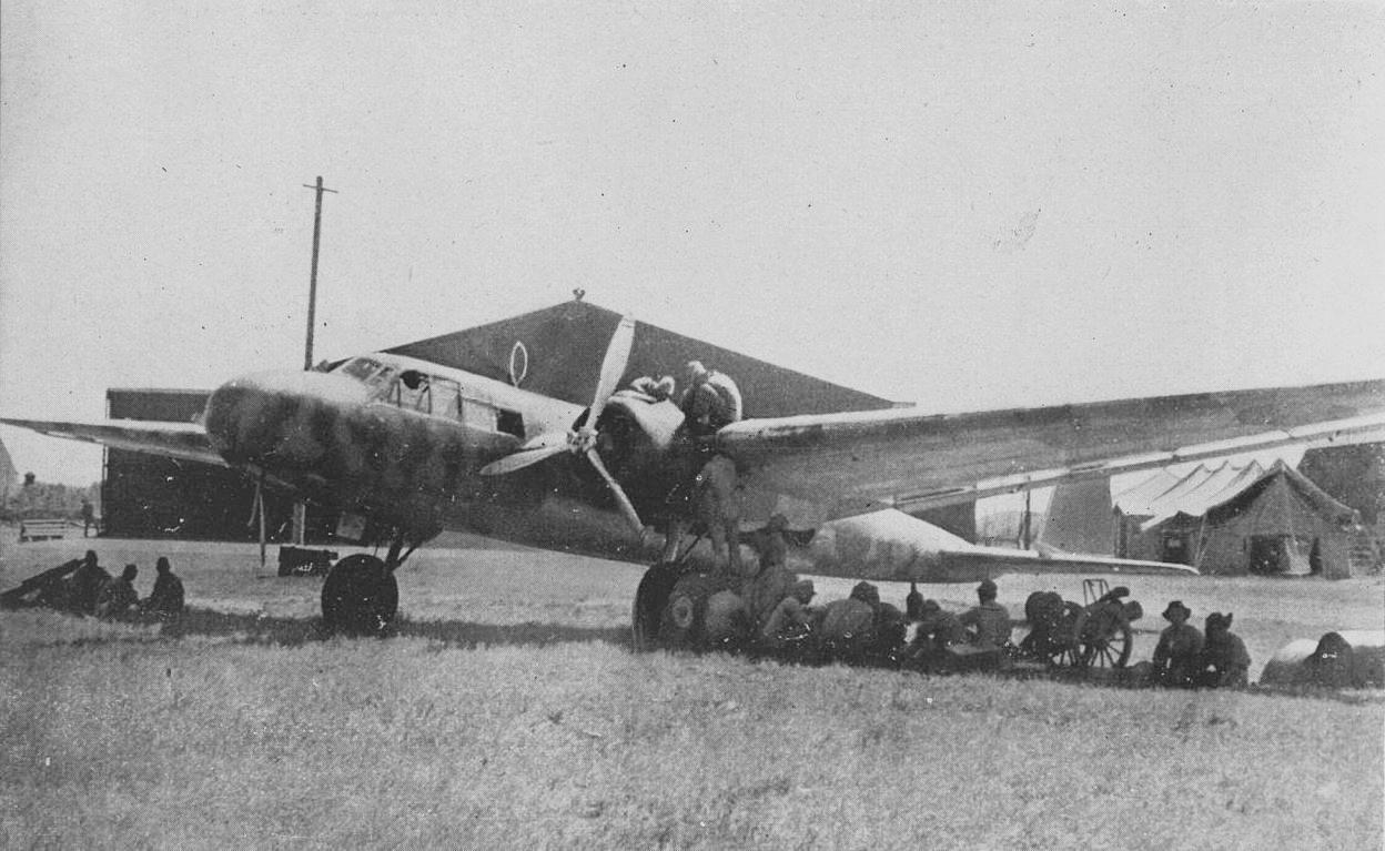 G3M crew members beneath their aircraft